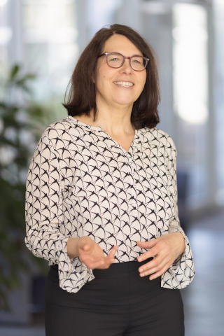 Coaching für die berufliche Weiterentwicklung von Führungskräften Coach und angehende Führungskraft im Gespräch