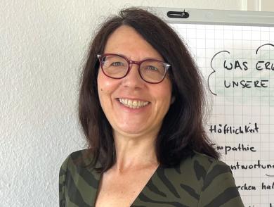 Coaching für die berufliche Weiterentwicklung von Führungskräften Coach und angehende Führungskraft im Gespräch